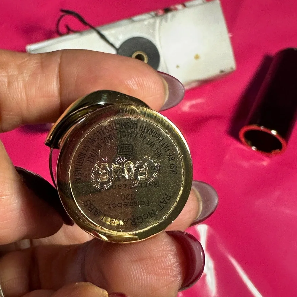 Luxurious Lipstick by PatMcgrath with Gold Accent in shade 020 Femmebot.
